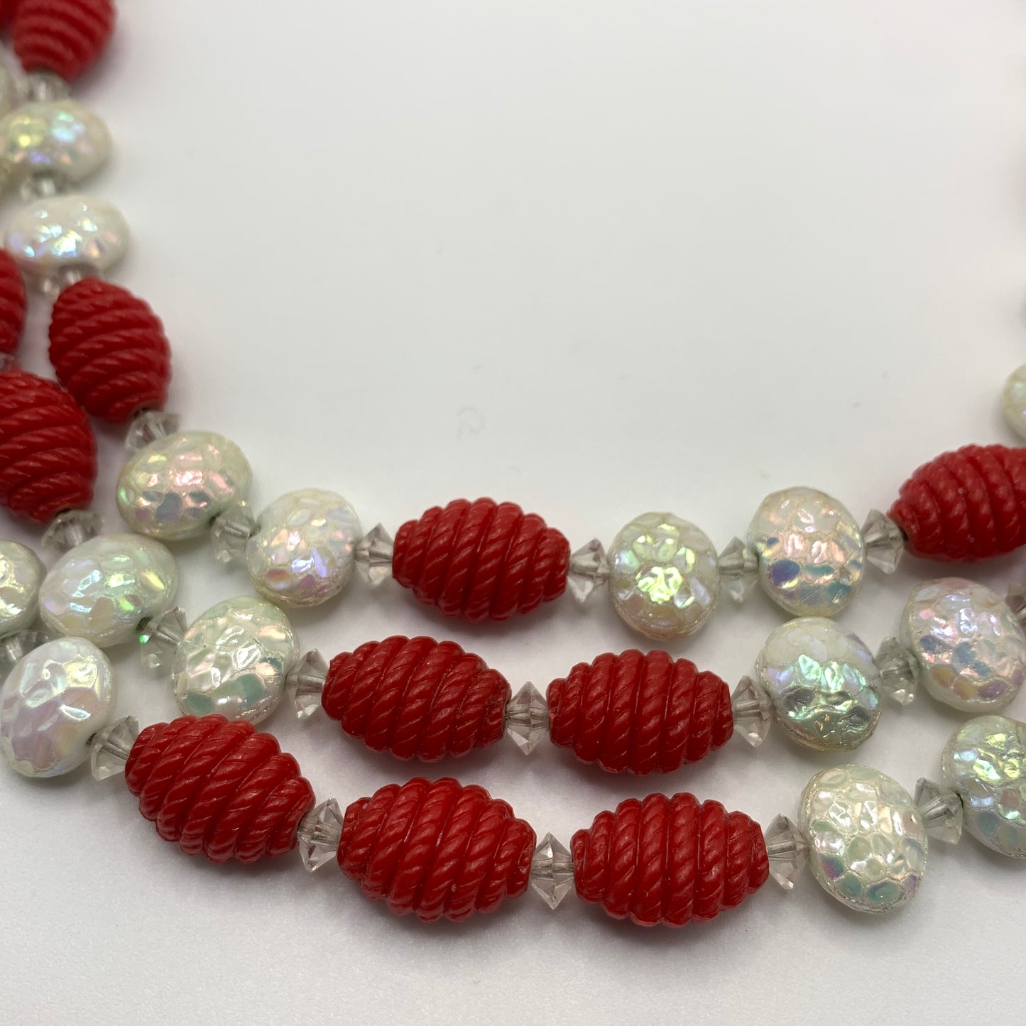 Rare Vintage unsigned Hobé triple strand red & pearlescent beaded necklace