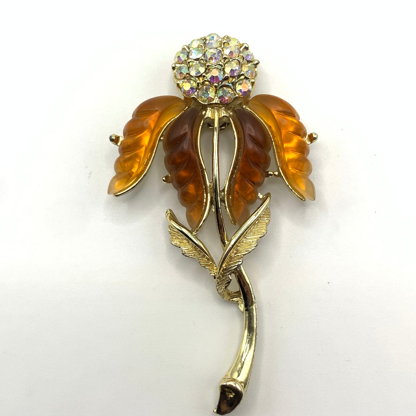 Vintage unsigned amber tone and AB rhinestone Thermoset flower brooch