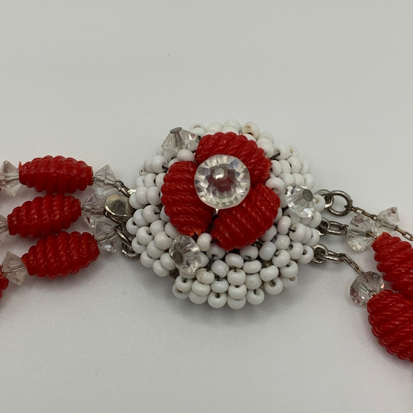 Rare Vintage unsigned Hobé triple strand red & pearlescent beaded necklace
