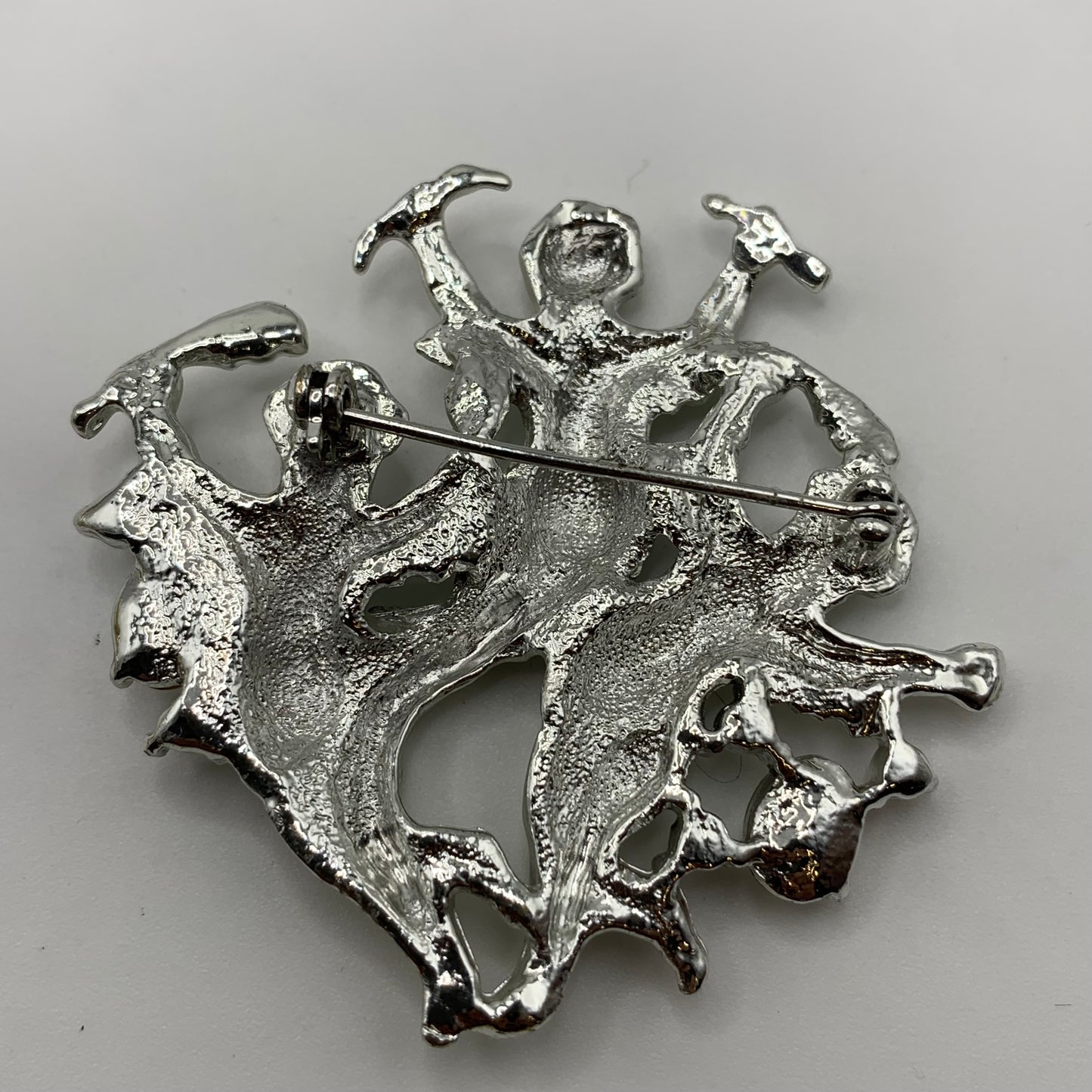 Vintage Cupid angel shaped silver tone brooch