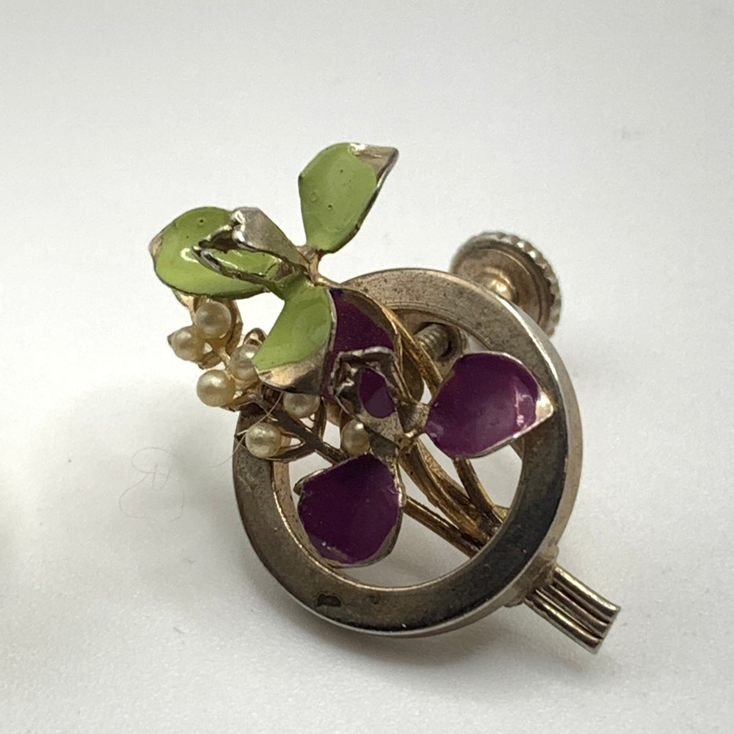 Vintage unsigned purple and green enamel faux pearl flower screw back earrings