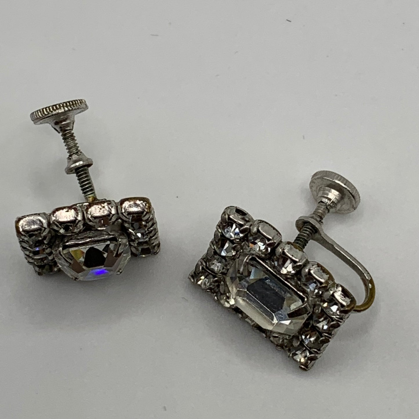 Vintage unsigned chromium plated clear rhinestone screw back earrings