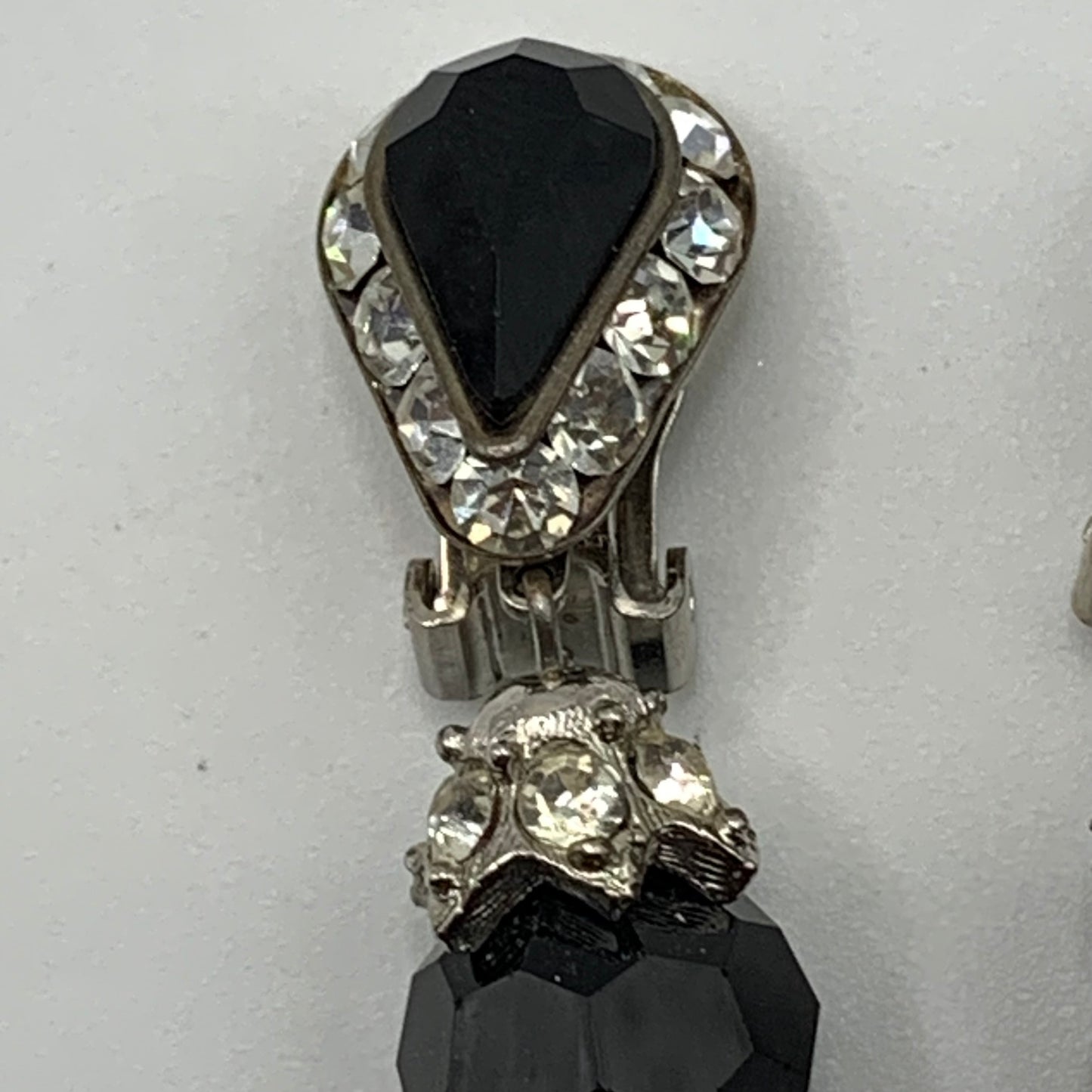 Vintage unsigned silver tone jet black glass and clear rhinestone dangle clip on earrings