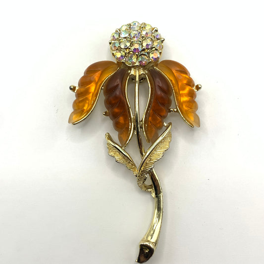 Vintage unsigned amber tone and AB rhinestone Thermoset flower brooch